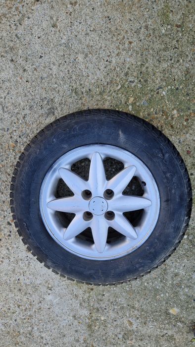 Vand 4 roti originale chevrolet aveo pe 14 cu cauciucuri de iarna