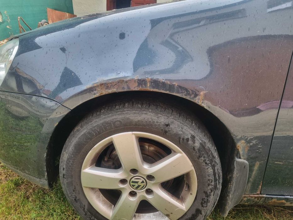 Volkswagen golf 5    1.6 benzină