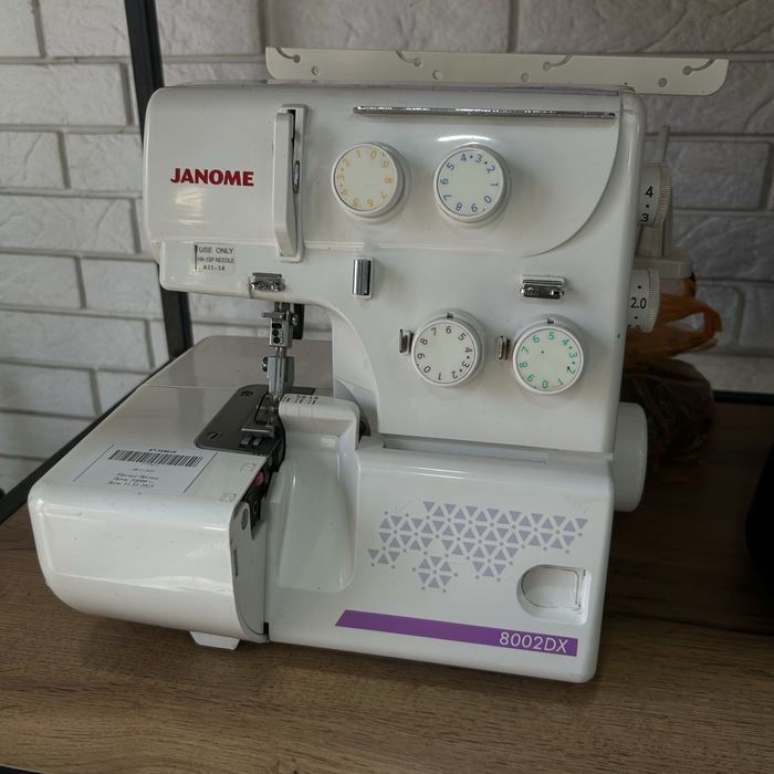 Оверлок Janome 8002DX