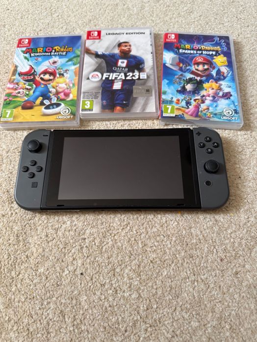 Nintendo switch + 3 jocuri + folie