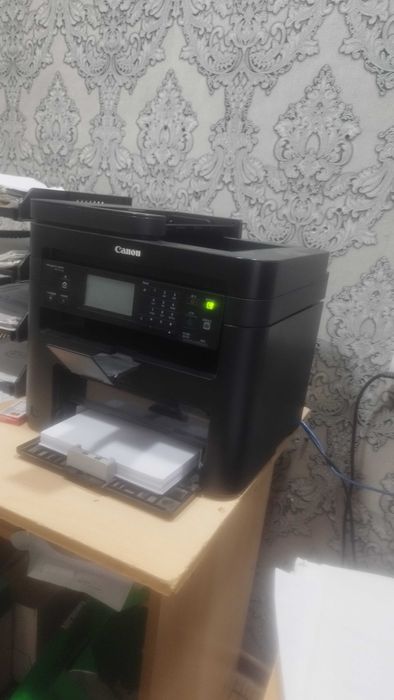 Canon 235 holati idiyal