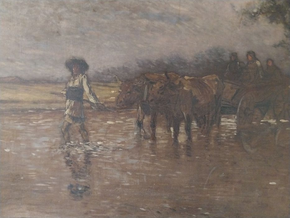 Car cu țărani traversând un parau.