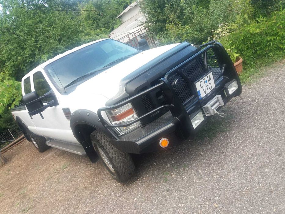 Ford F350 volan pe stanga si 4 usi.