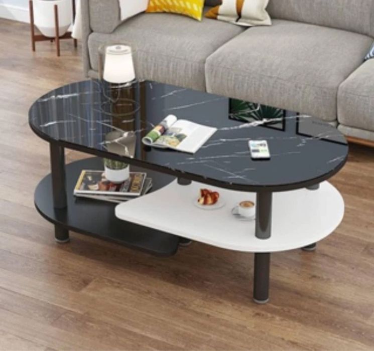 журнальный столик двухуровневую конструкцию овальной формы.