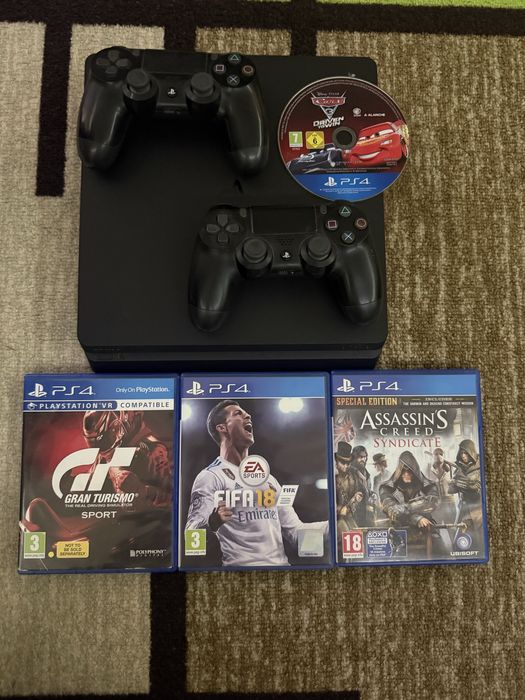 Продавам Playstation 4 slim 1TB с два контролера и 4 игри