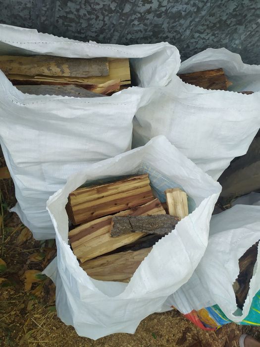 Продам  рубленные дрова  в мешках