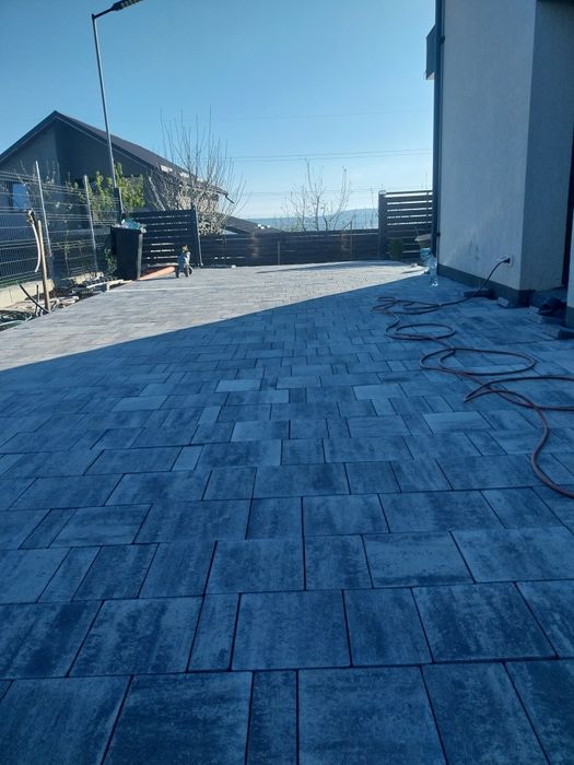 Montaj pavaje borduri rigole piatra travertin gazon județul Iași