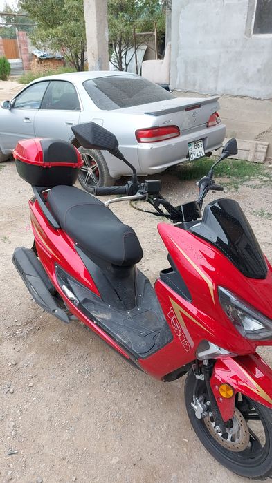 Макси скутер тоё.