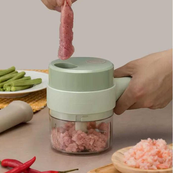 Tocator de legume cu 4 functii: taiere, feliere, maruntire si decojire