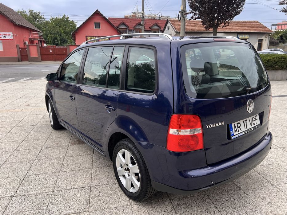 Vand sau schimb vw turan dsg 7 locuri