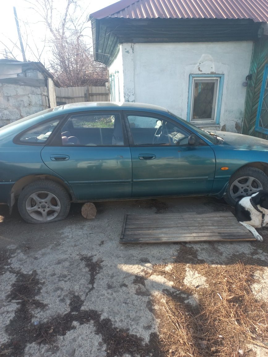 Мазда кронос 1992 ,1.8 на запчасти только целиком