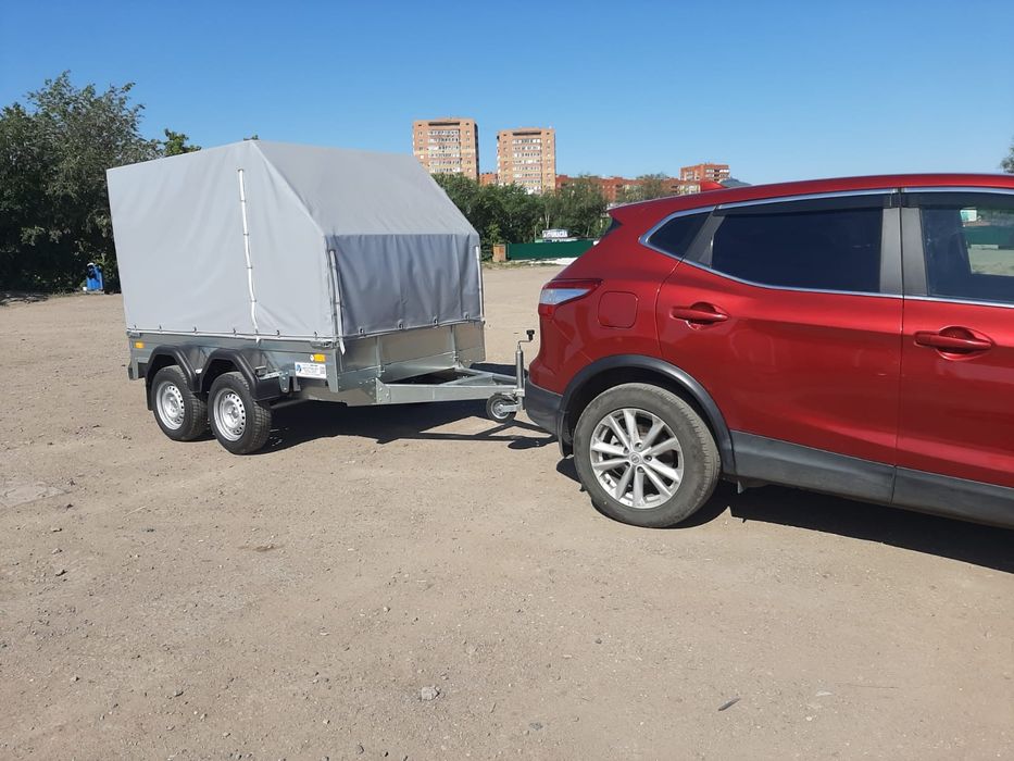 Прицеп двухосный тентованный в хорошем состоянии, производство Саранск