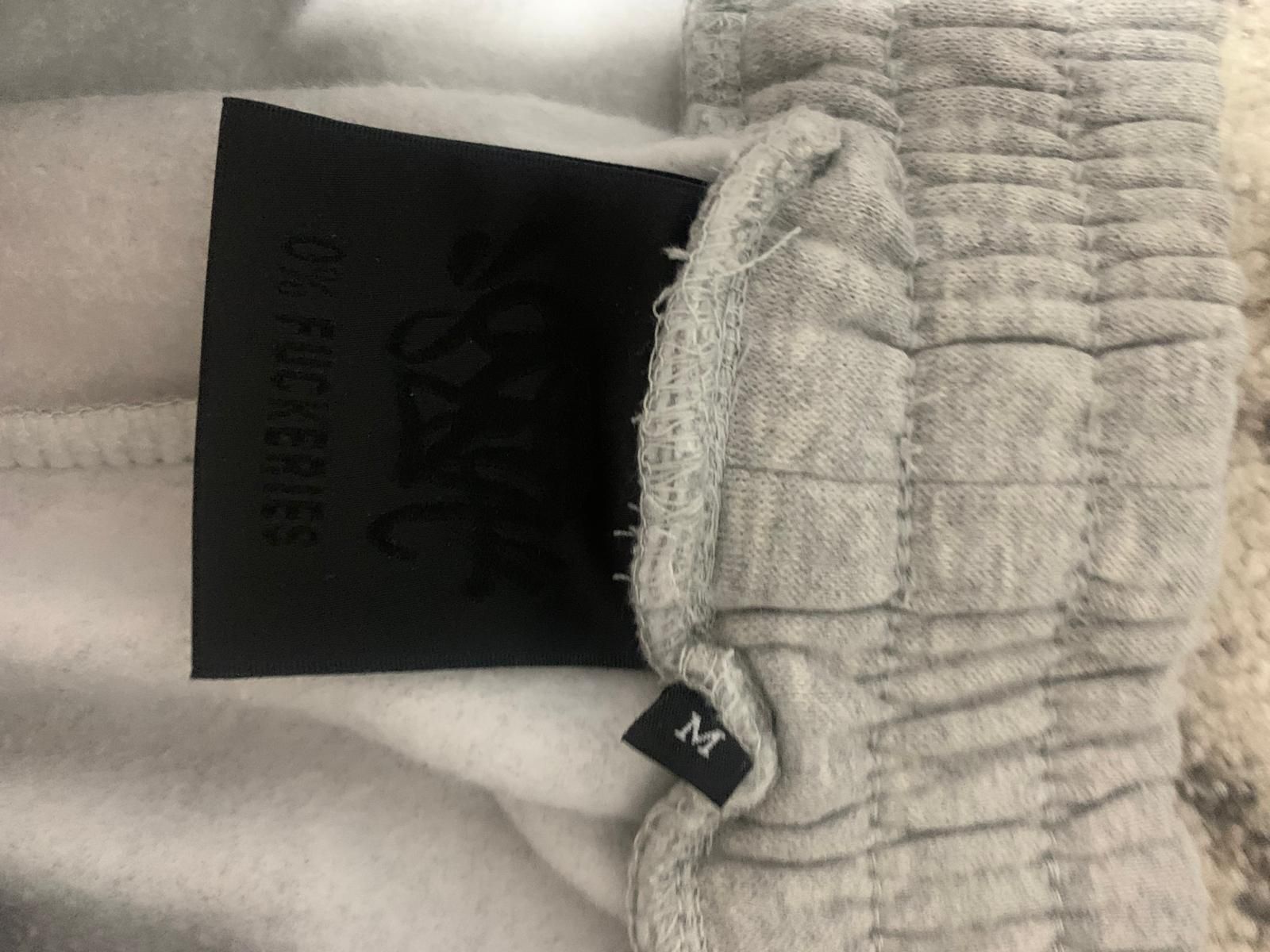 Pantaloni syna world