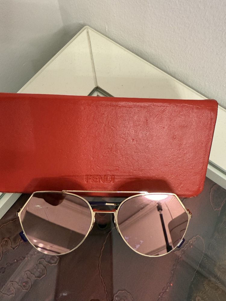 Слънчеви очилa на Guess i Fendi