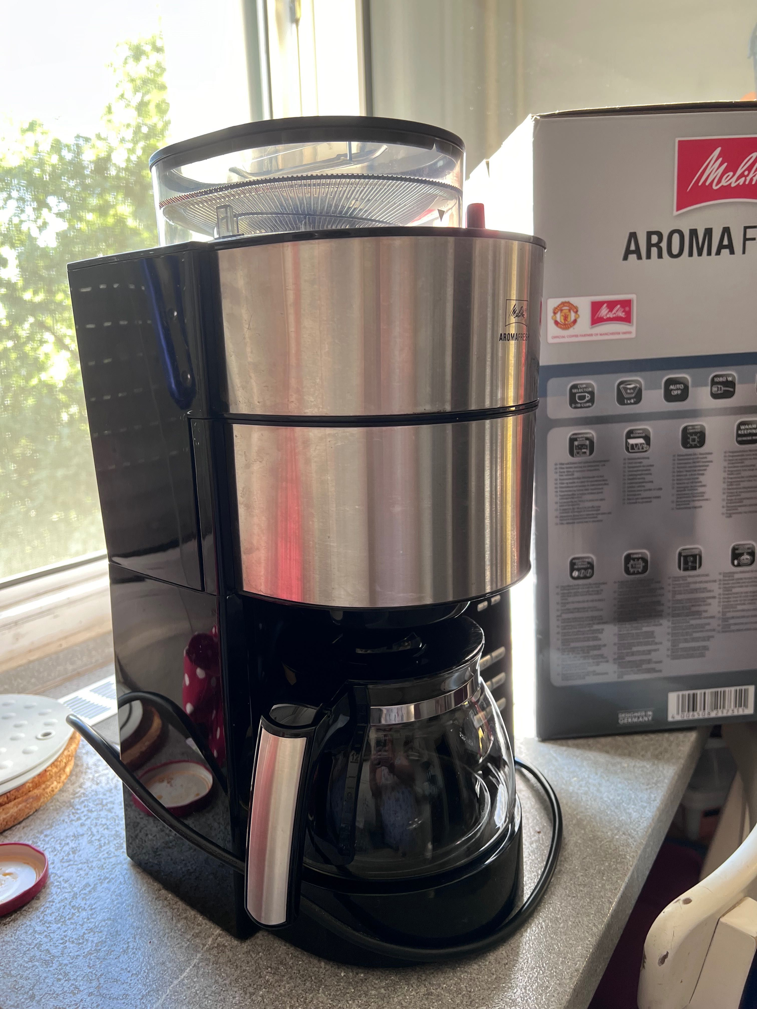 Cafetiera Melitta cu rasnita si timer
