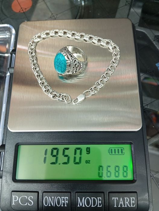 Kumush uzuk va braslet