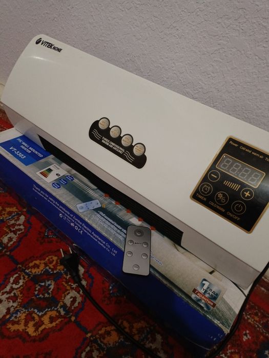 Mini konditsaner.Issiq va sovuq xavo chiqaradi.Pulti bor. Yangii