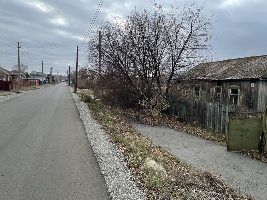 Продам земельный участок с постройками