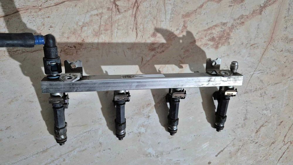 Rampa injectoare Opel Corsa D 1.2 benzina Z12XEP