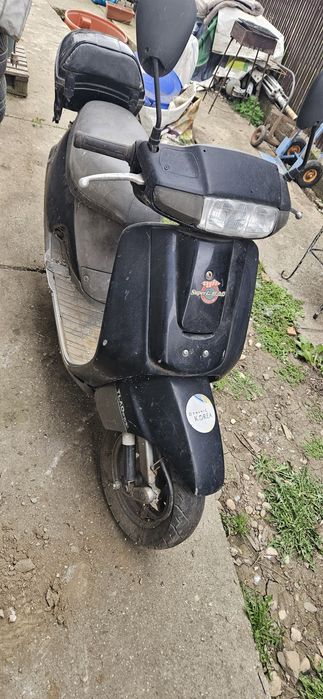 Scuter kyimco ,cu motor honda.