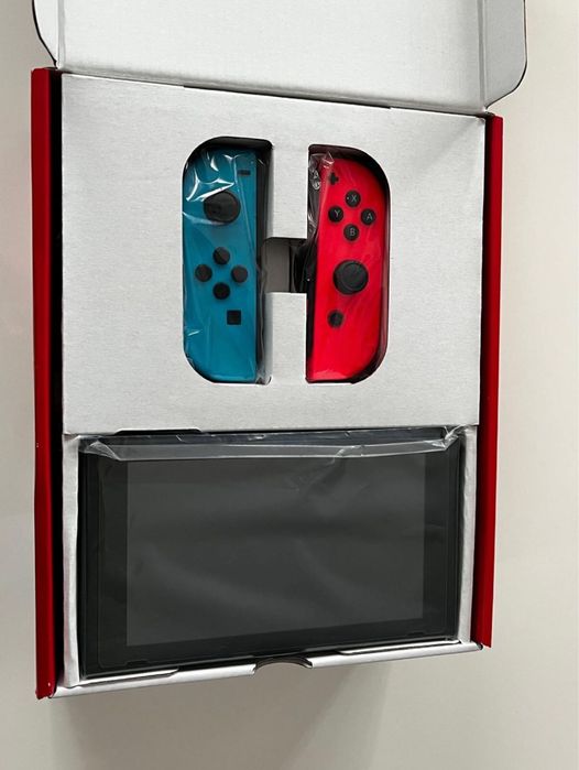 Nintendo switch 2023, ca nou + accesorii si jocuri.