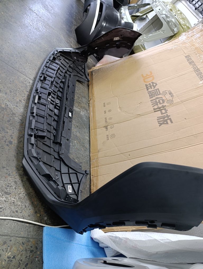 Передний бампер Geely Atlas