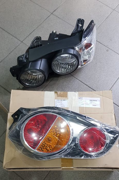 Far stop Chevrolet Aveo rama ochelar far