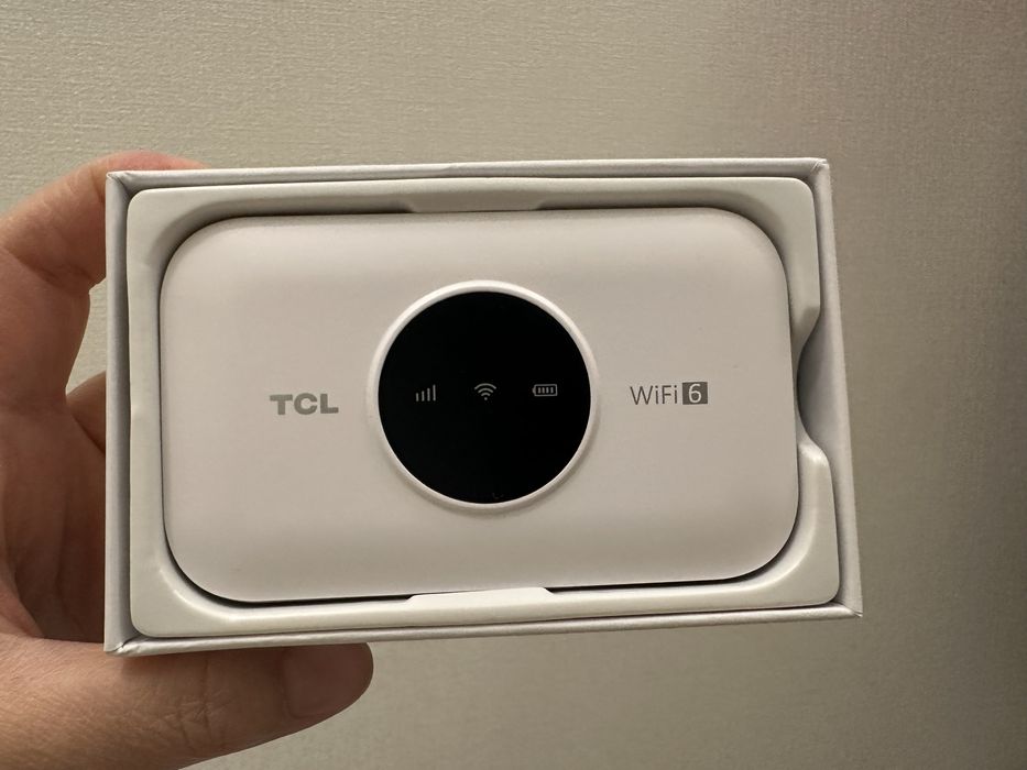 Портативный можем роутер TCL