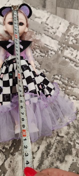 Păpușă flexibilă care cântă nouă