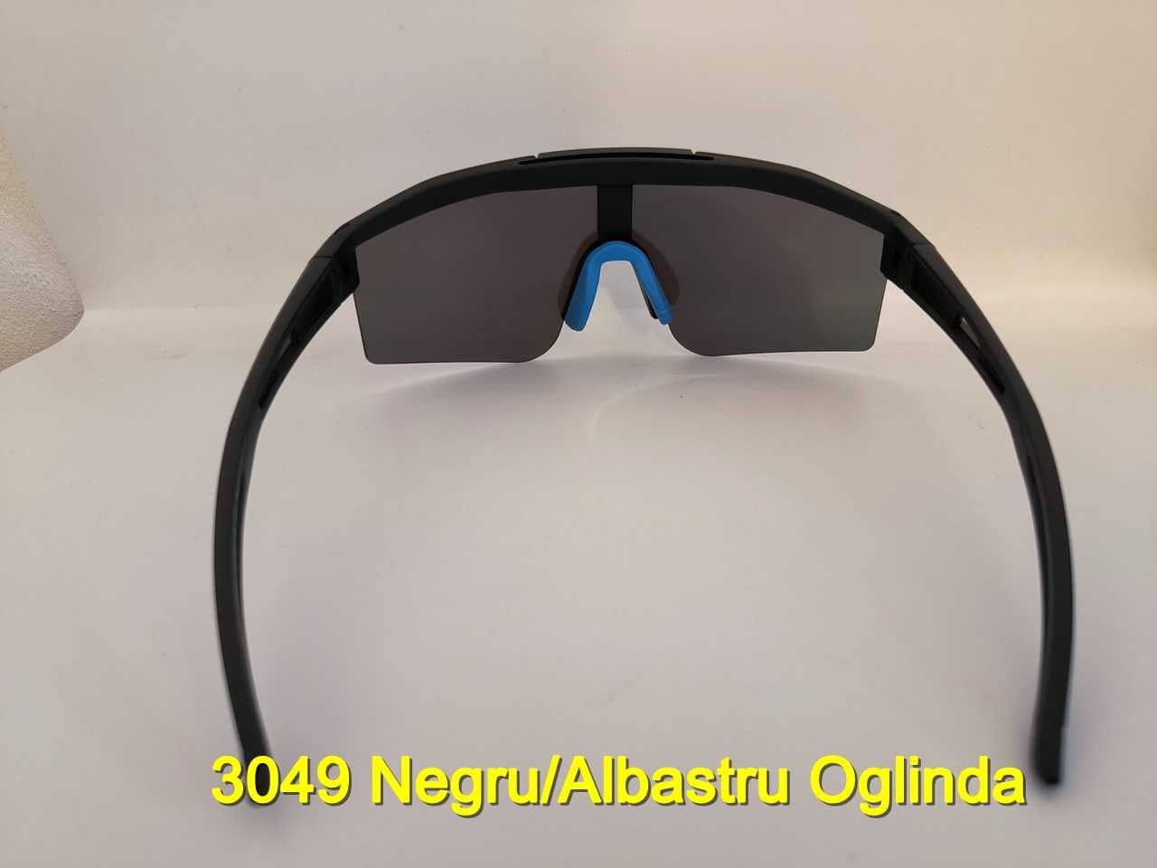 Ochelari de soare polarizati cu rama semi-inchisa si lentile albastre
