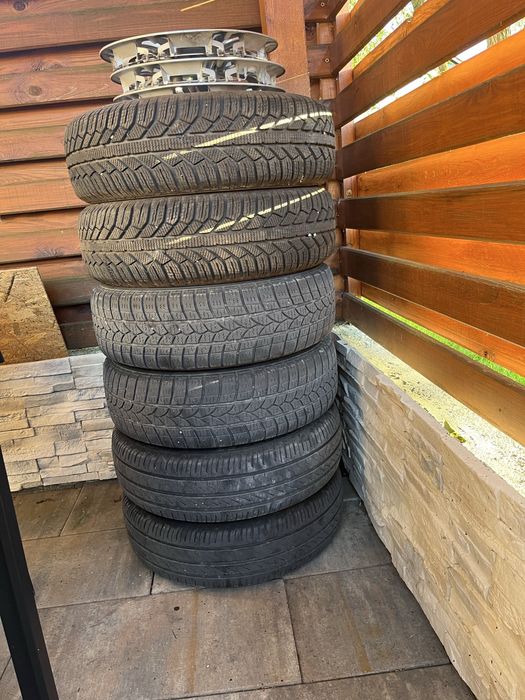 Vand jante R14 5x100 cu anvelope 185 70 R14 iarna si capace