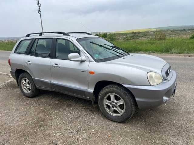 Usa/usi stanga/dreapta/fata/spate Hyundai Santa Fe 2003 pe argintiu