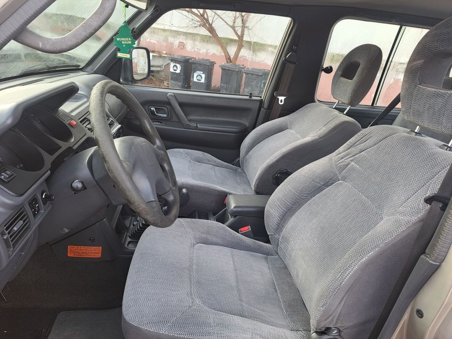 Mitshubishi pajero 2.5 an 2004 clima