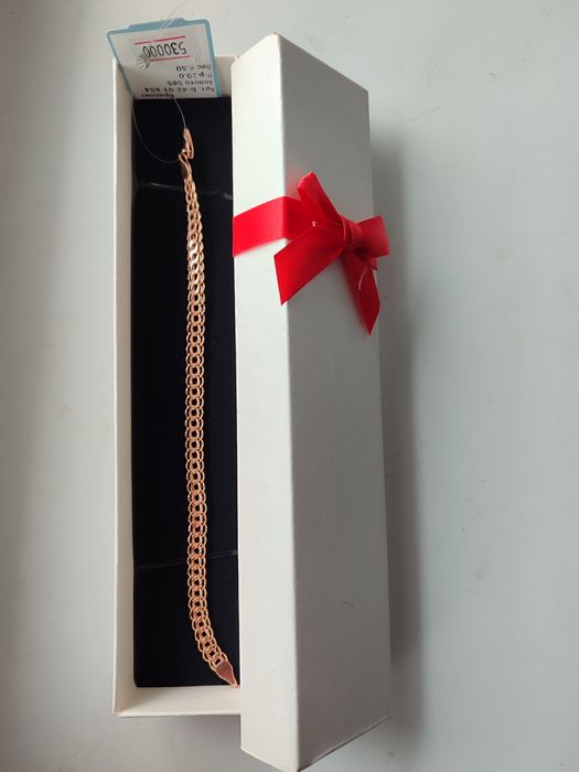 Продам новый золотой браслет