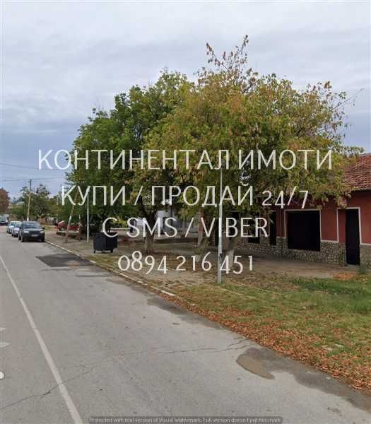 код 63001. Парцел 3800м2 в центъра на селото с лице на главната улица