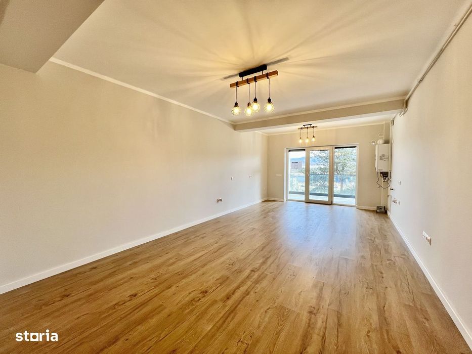 Apartament 2 camere - Finisat la cheie, balcon mare