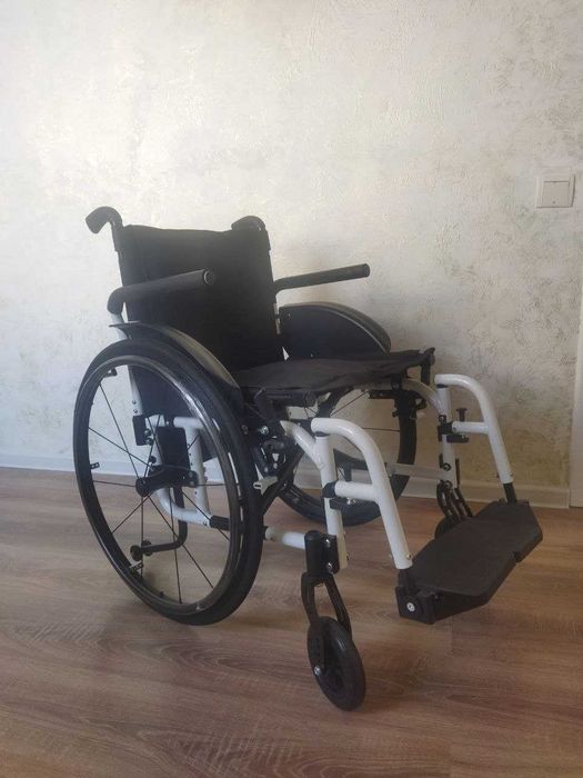Инвалидная коляска