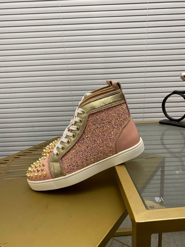 Louboutin “WMNS”
