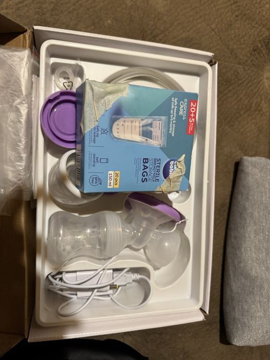 Помпа за кърма и раница за бебешка количка