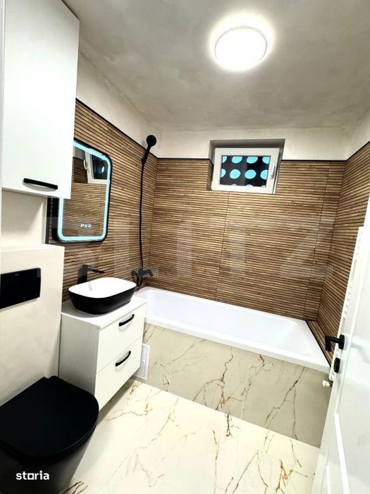Apartament cu 3 camere, renovat complet, etaj 2, zona Tractorul