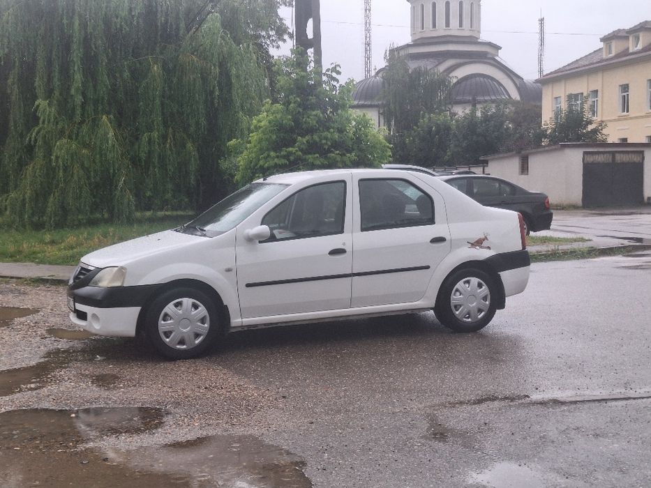 vând Logan 1.4 benzina
