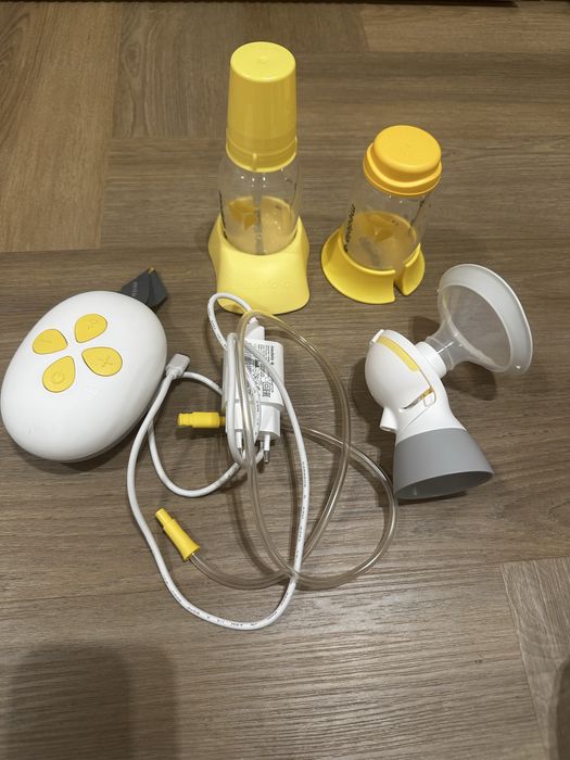 Продам электрический молокоотсос medela