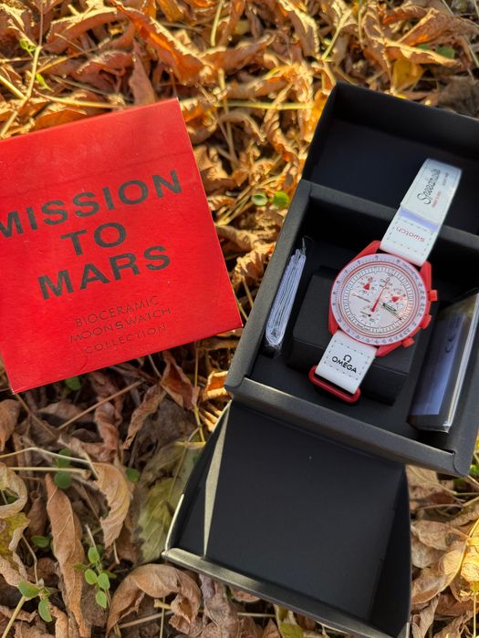 Omega Swatch mission to mercury sun pluto earth venus neptune uranus