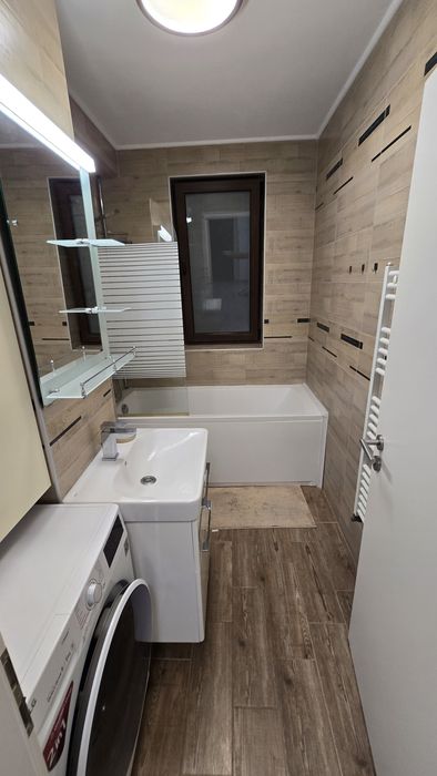 Apartament modern, 2 camere + loc de parcare privat, Sânpetru