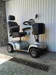 Carucior scuter electric scaun dizabilitati  carut tricieleta handicap
