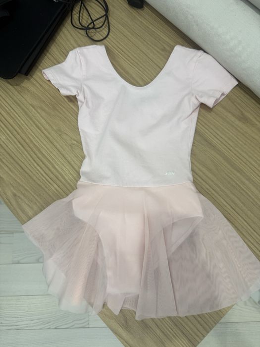 Продам гимнастический купальник, состояние нового
