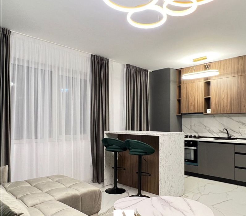 Inchiriez apartament 2 camere cu living open space.