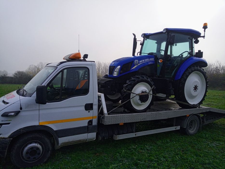 Tractari auto Roman.Tractoare ,Platforma hidraulica.Servicii macara