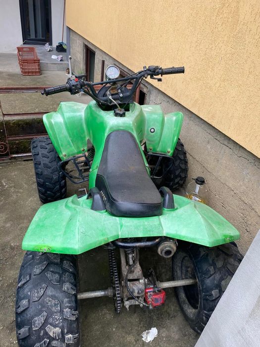 Vând atv 125 în 4 t