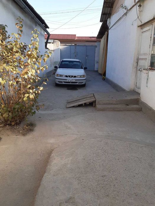 ул.М.Ашрафи ор-р маг. Счётчики Участок 3,14сот Дом 5ком 77м2 Фасад 12м